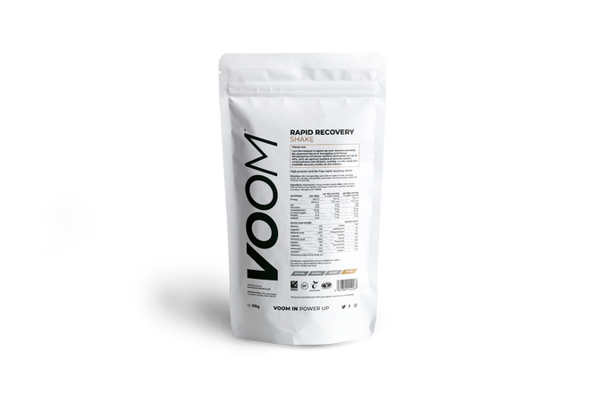 VOOM Rapid Recovery Shake pouch, white with black text and golden brown detail, nutritional tables are shown